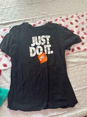 Nike Black Tee with White 'JUST DO IT.' and Orange Logo